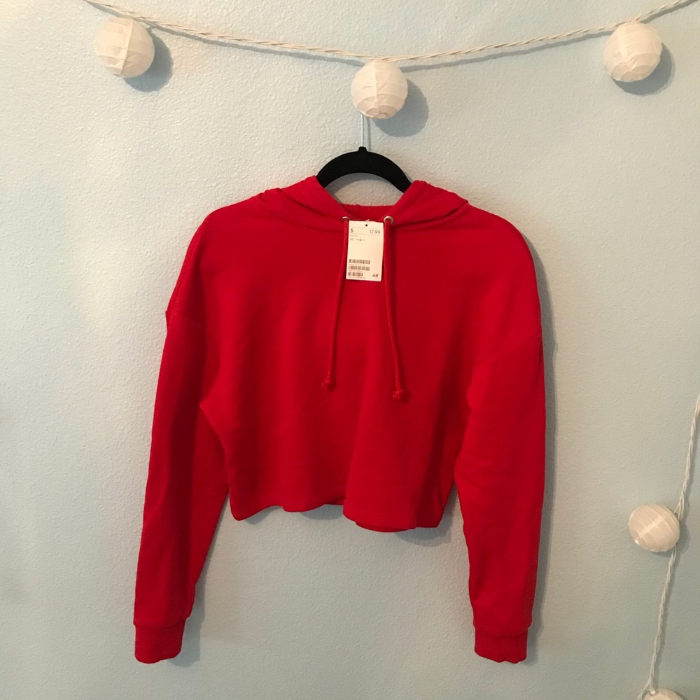 Red cropped hoodie, never been worn, size small